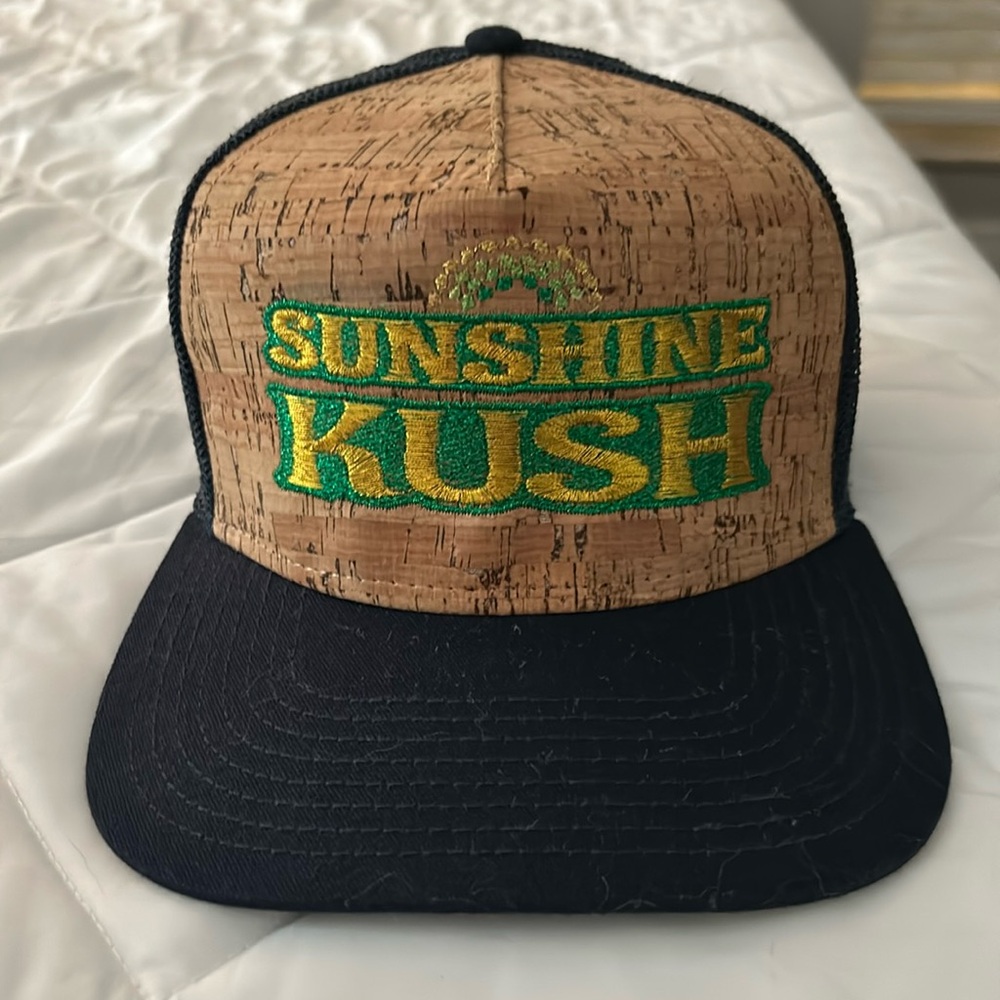 Men’s trucker hat Sunshine Kush adjustable snap back.